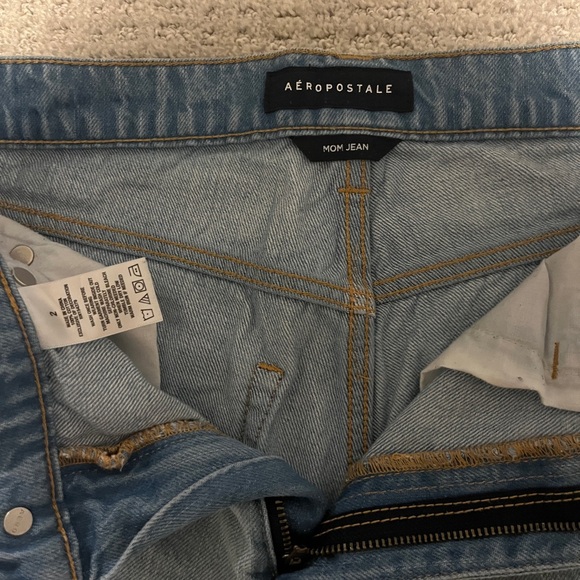 Light Wash Ripped Jeans - Picture 2 of 2